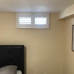 Composite Plantation Shutters Over Tiny Basement Windows on Arban Dr in St. Louis, MO